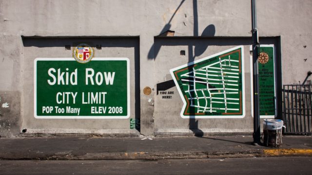 green-street-sign-for-skid-row