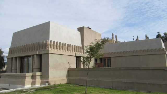 an exterior shot of hollyhock house in barnsdall art park on a sunny day