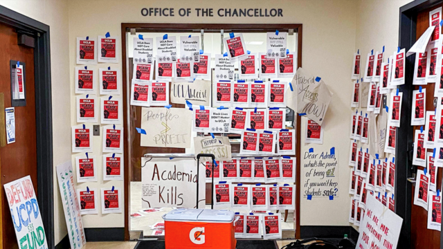 This is a photo of Chancellor Gene Block's Office Covered in Protest Signs saying UCLA does not keep students safe