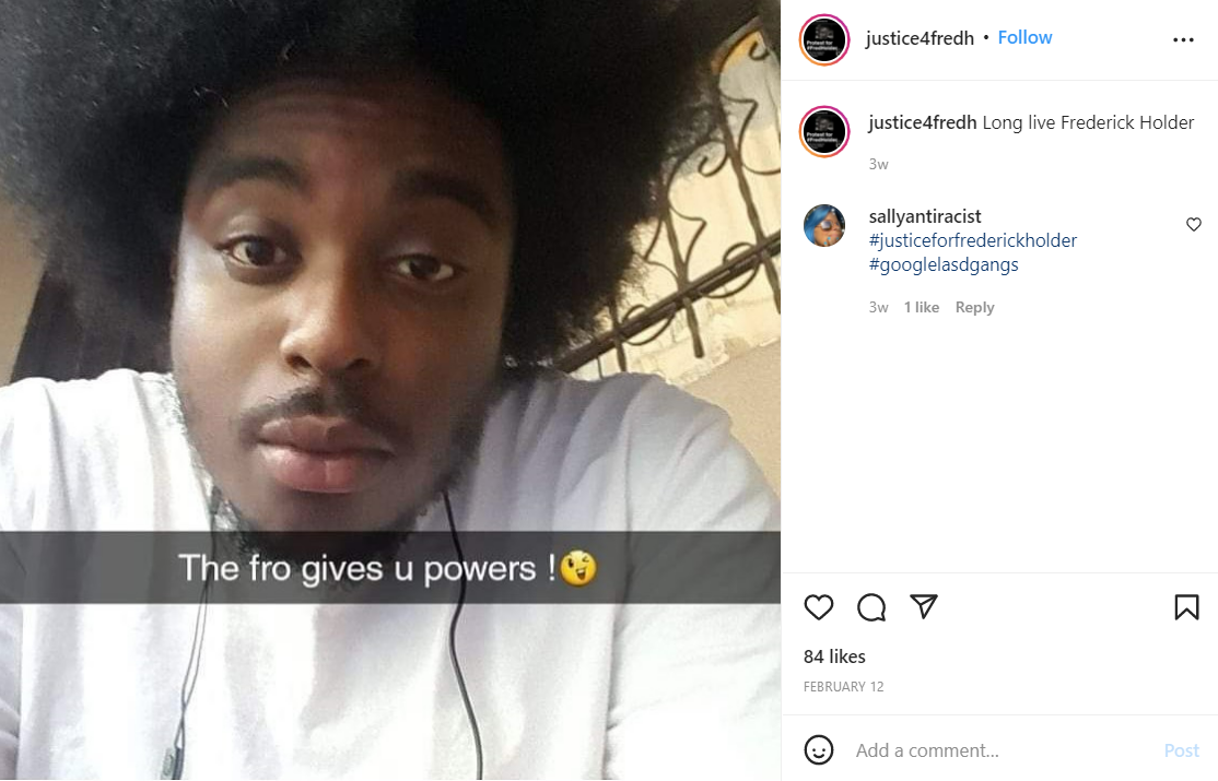 an instagram photo of frederick holder wearing a white shirt with the caption "the fro gives u powers!"