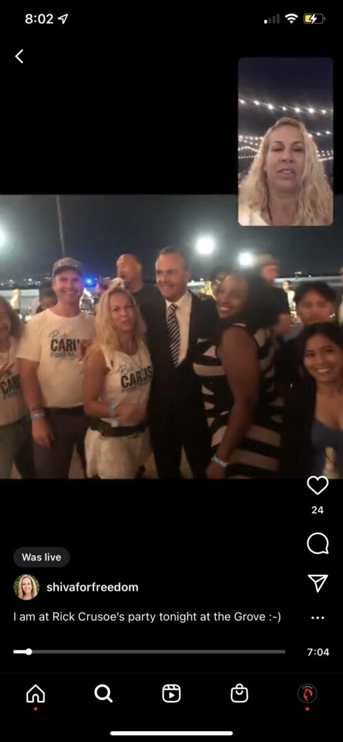 A group poses with Caruso, whose arm is around Bagheri. The caption reads "I am at Rick Caruso's party tonight at the Grove."