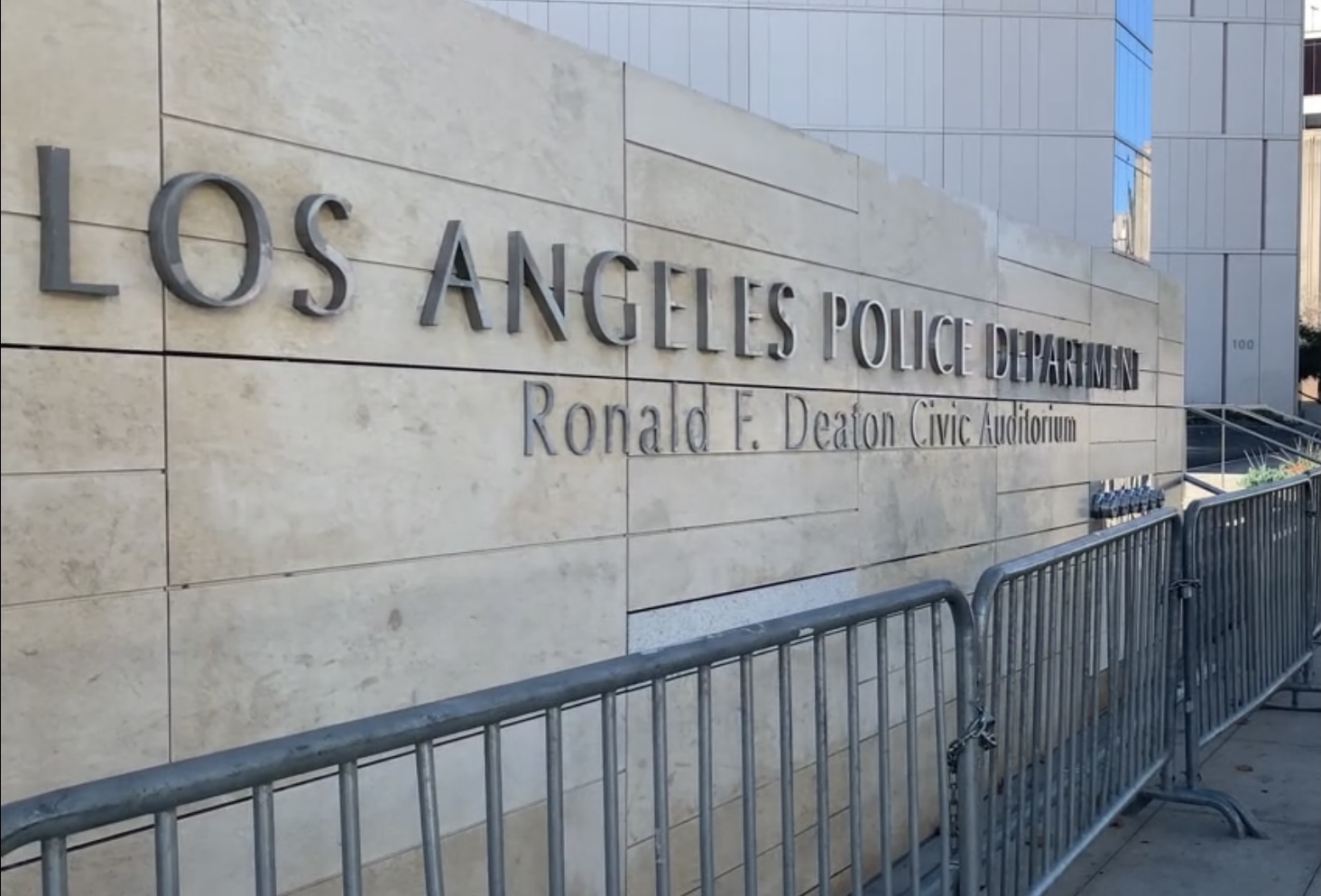 Fenced-off outside wall of LAPD's Ronald F. Deaton Civic Auditorium