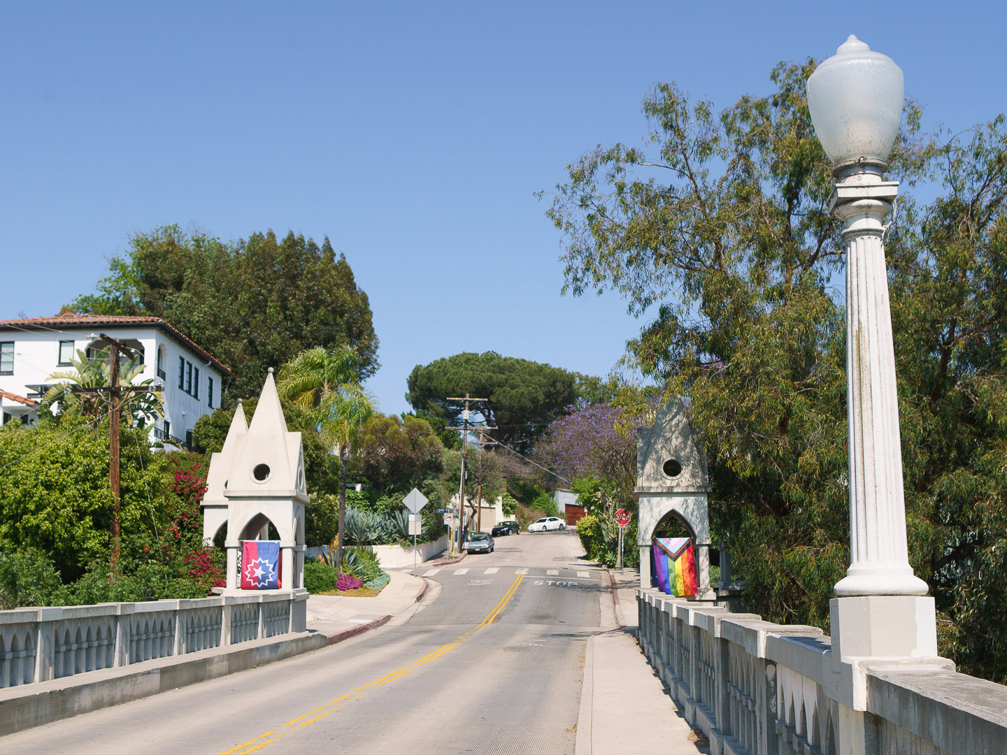 Shakespeare Bridge in Franklin Heights with Pride and Juneteenth flags displayed