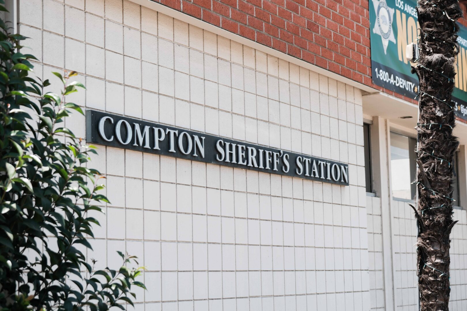 A sign outside the Los Angeles Sheriff's Department Compton station that reads "Compton Sheriff's Station"